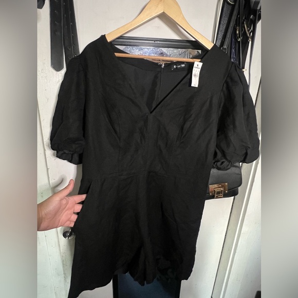 Express Black Romper with Puffy Sleeves - Picture 7 of 8